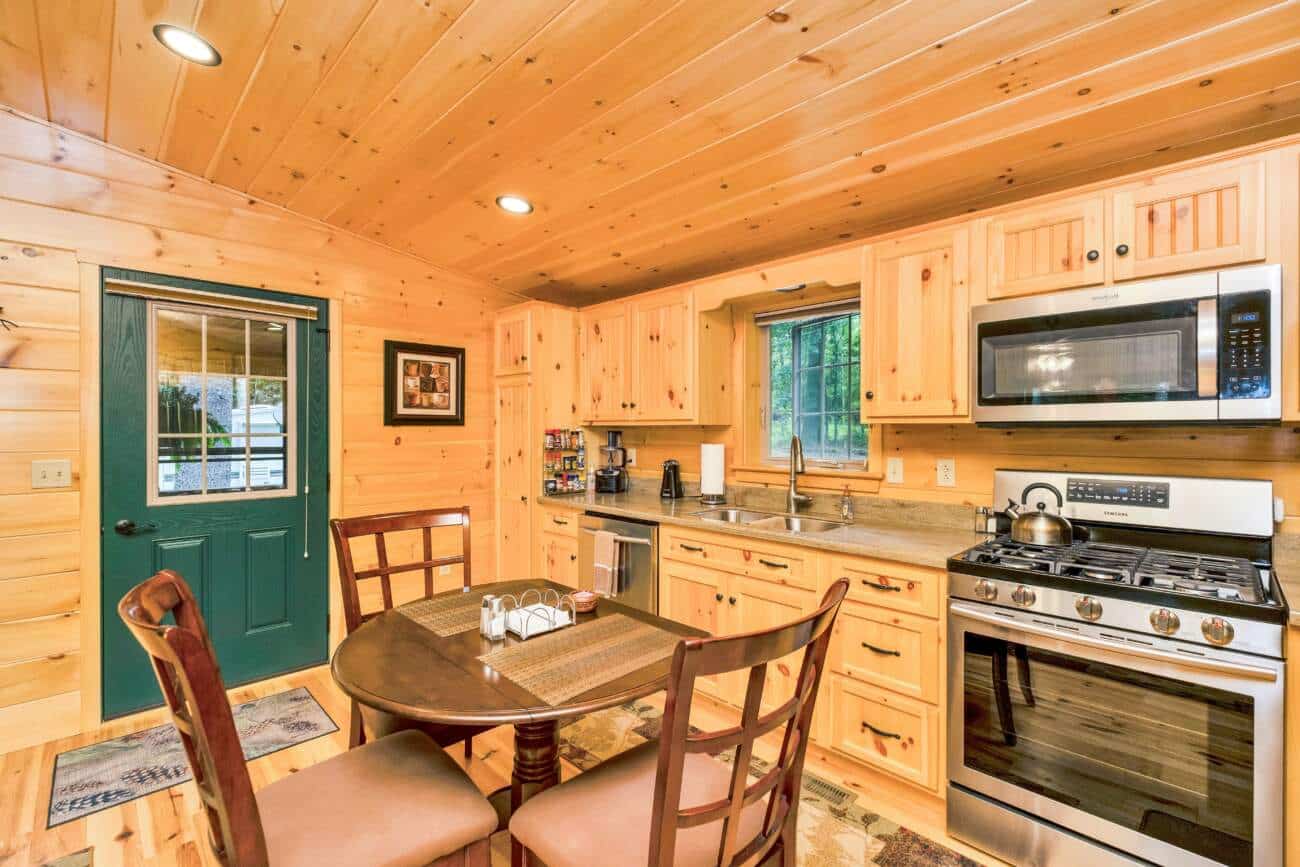 kitchen in musketeer Log Home in Cullowhee NC