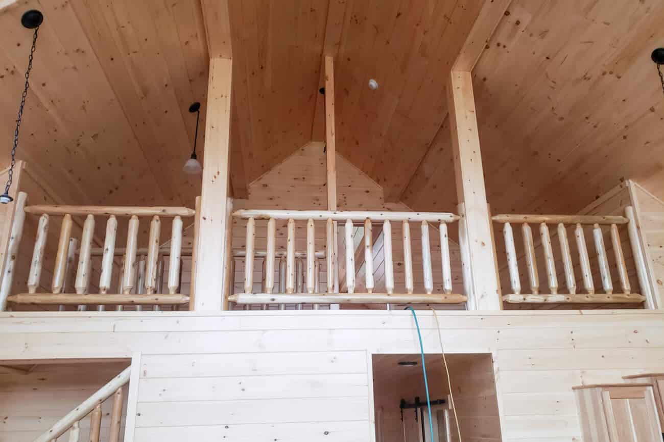 log interior loft in Prefab Cabin in Gilboa NY
