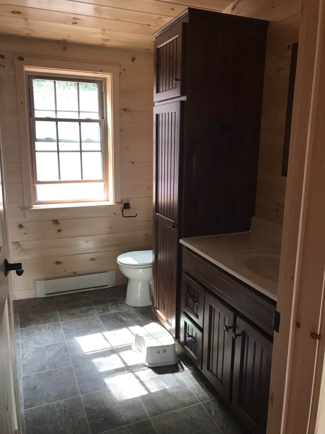 beautifully furnished bathroom inside a prefab log cabin in parson west virginia