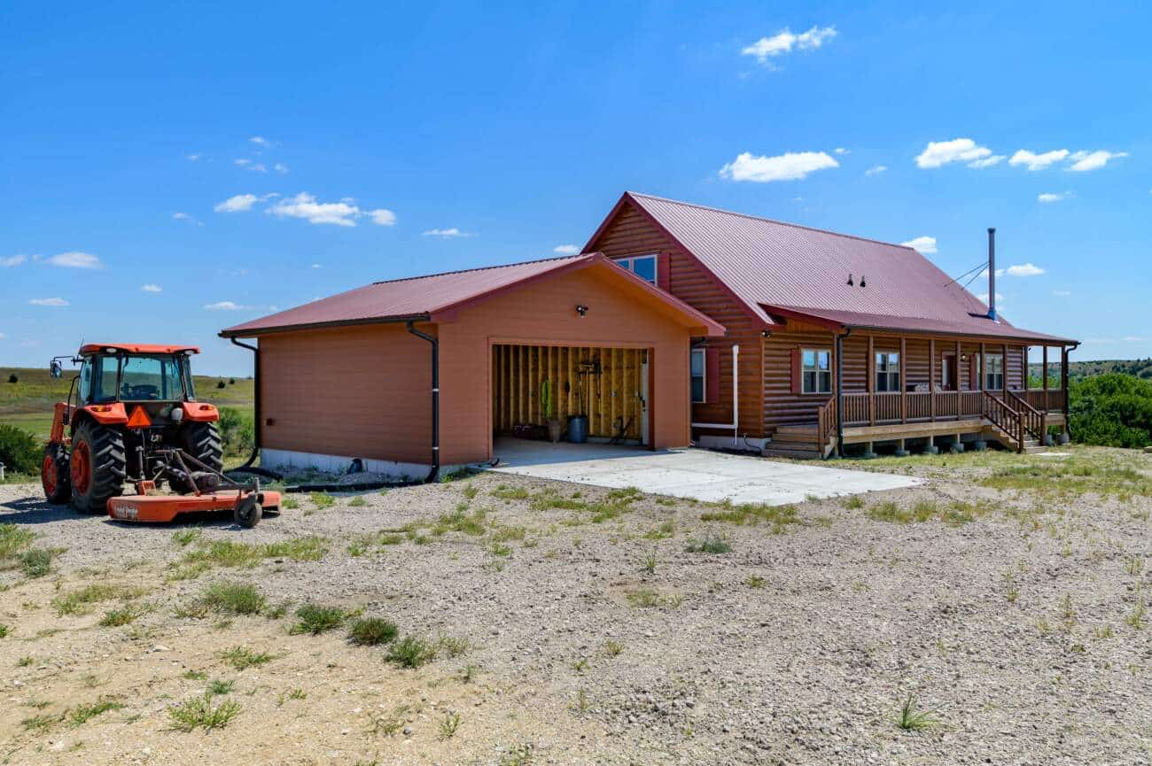 Log Home with Garage in Russell Kansas