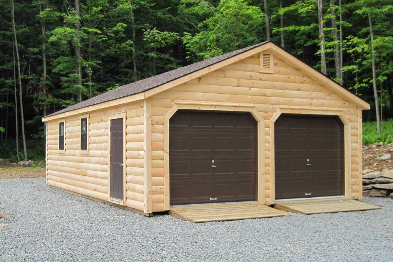 22x22 5 pitch truss log cabin garage