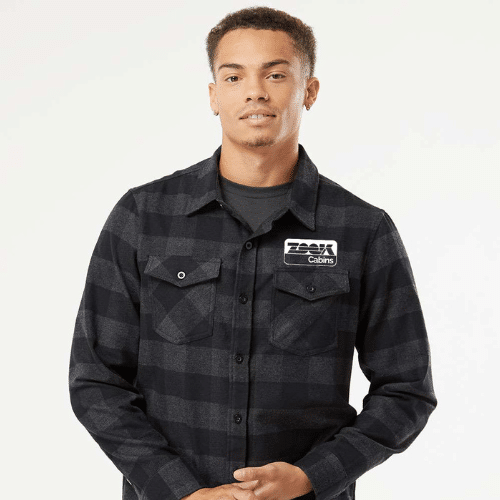 a model posing with a flannel shirt for sale