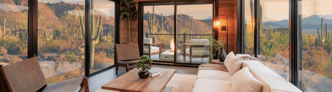 Inside a park model home with view of the desert and the park model's living room