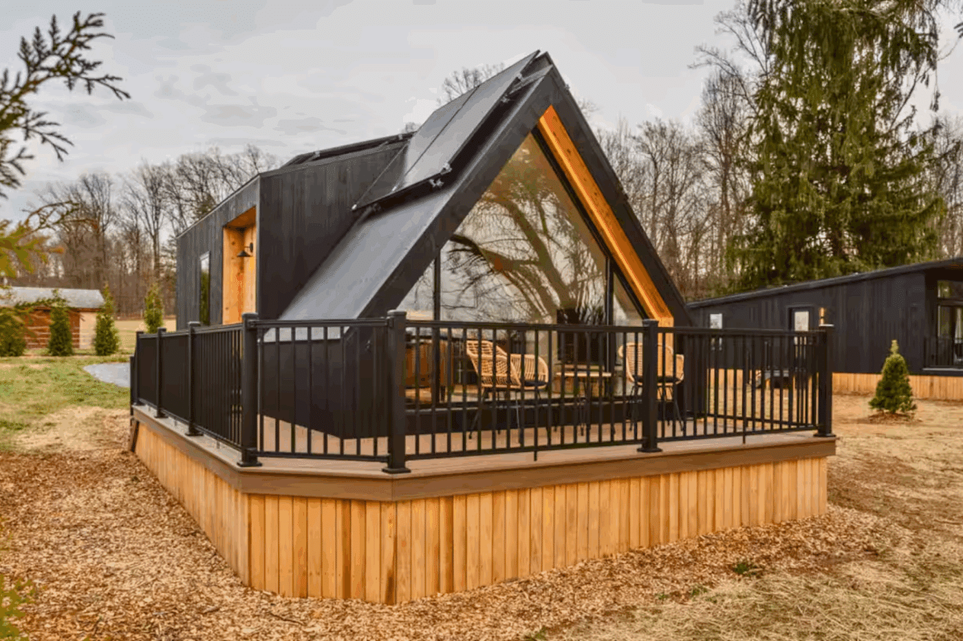 A Frame park model tiny home with solar panel built and designed by Zook Cabins