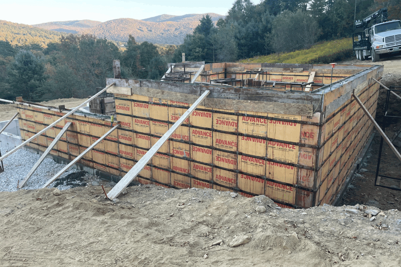 Foundation of 2 car garage basement for A Frame Modular home designed by Zook Cabins