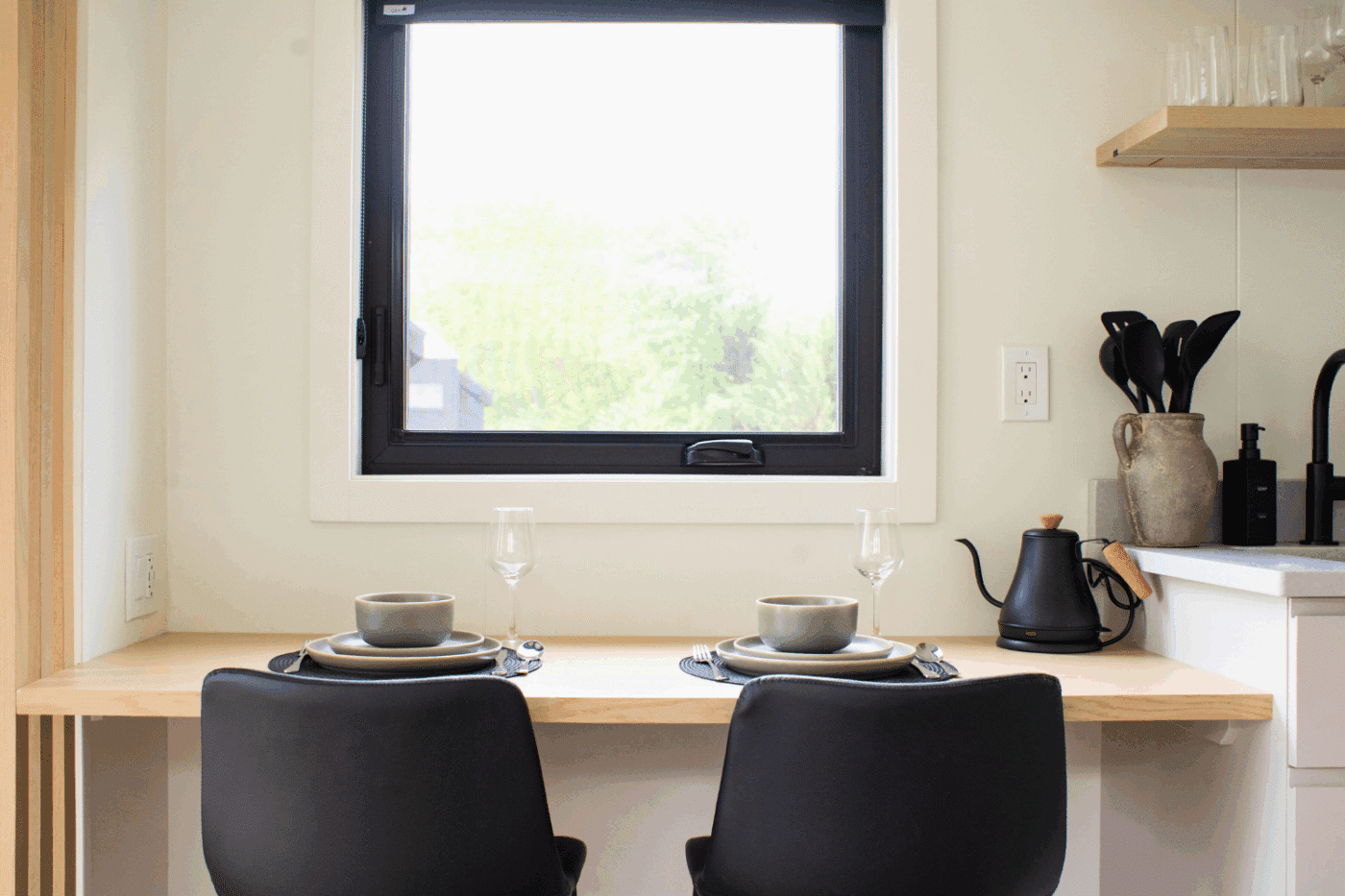 Dining area of A frame studio park model tiny home site 140 at Red Run Resort in New Holland Pa