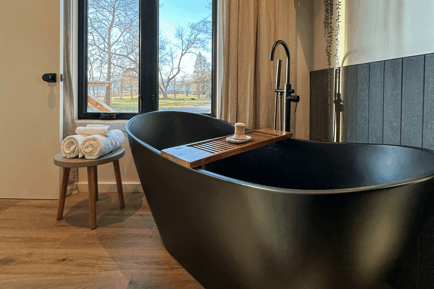 free standing soaking tub in Alpine park model tiny home built and designed by Zook Cabins