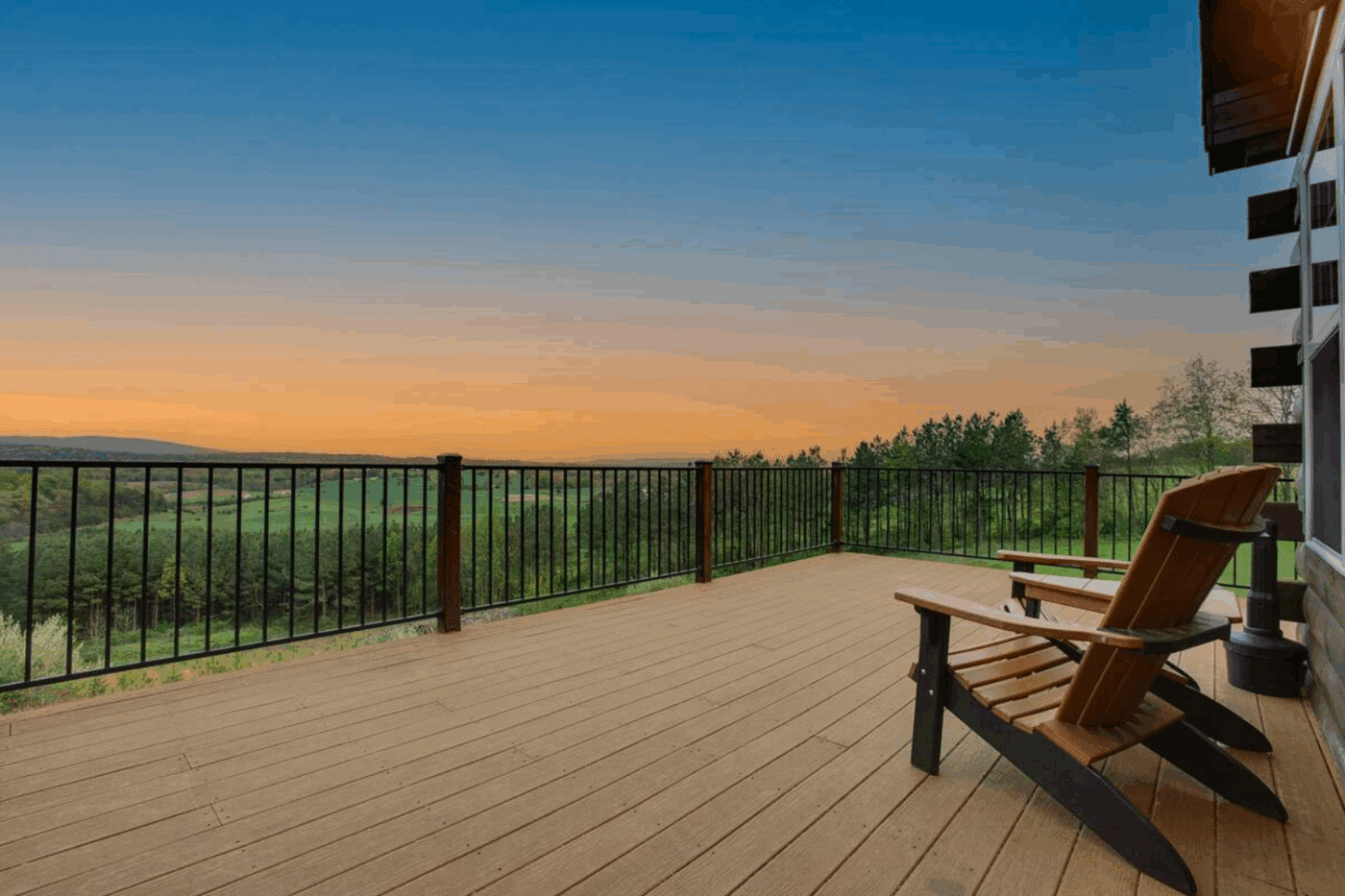 deck view from gable end mountaineer deluxe log modualr cabin in warfordsburg pa built and designed y Zook Cabins