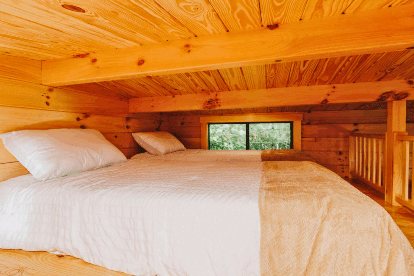 Loft sleeping area in Pinecrest park model tiny home designed and built by Zook Cabins located in Campton Kentucky