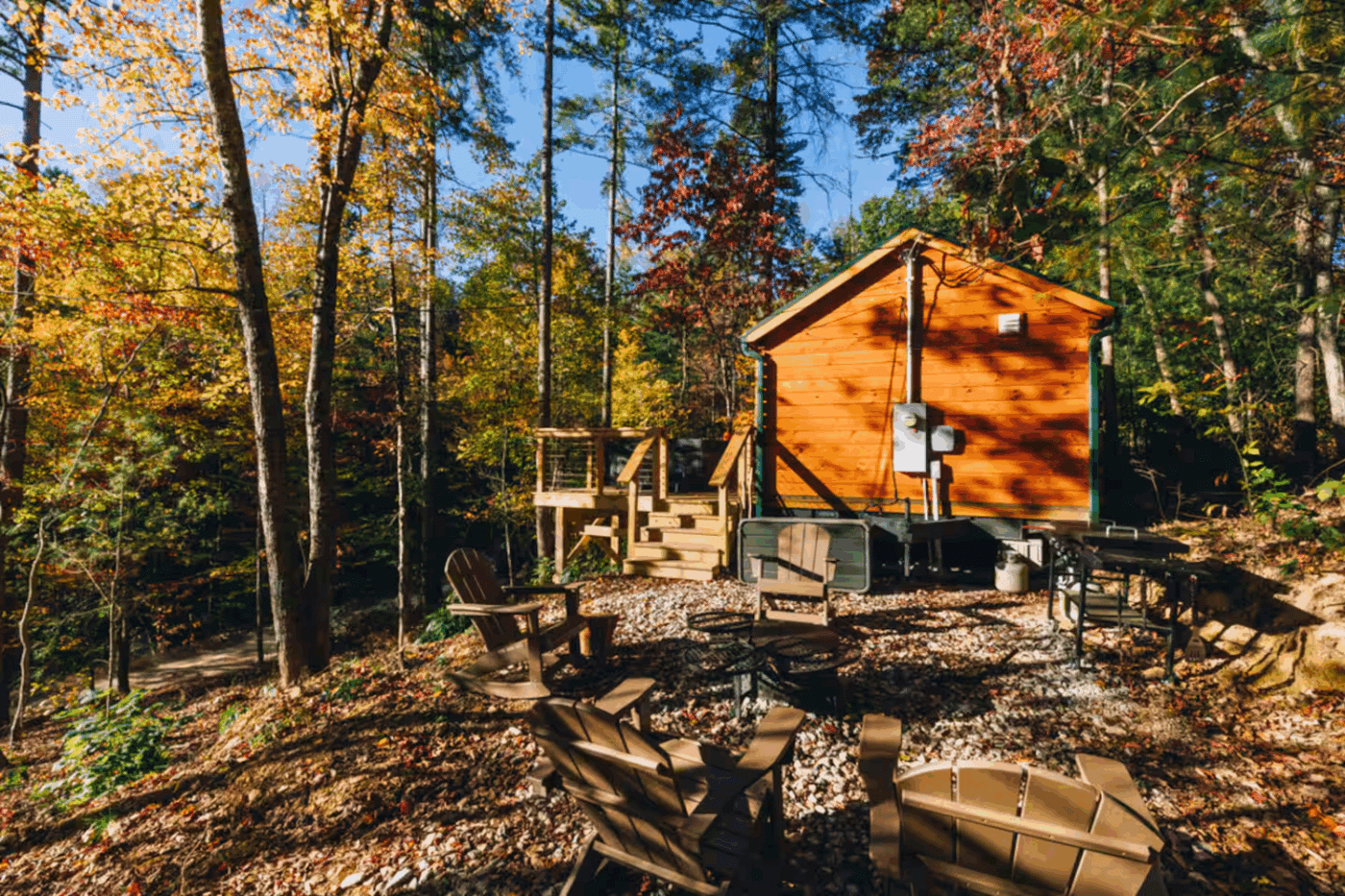 Pinecrest Park model tiny home in with porch in the woods in Campton Kentucky designed and built by Zook Cabins