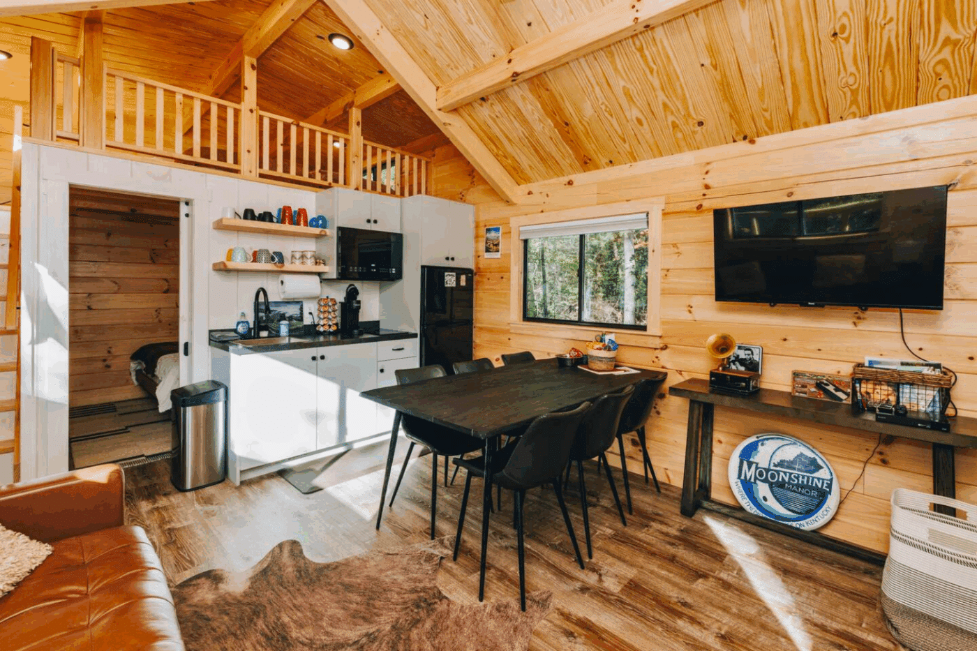 Pinecrest park model tiny home built and designed by Zook Cabins kitchen and dining area