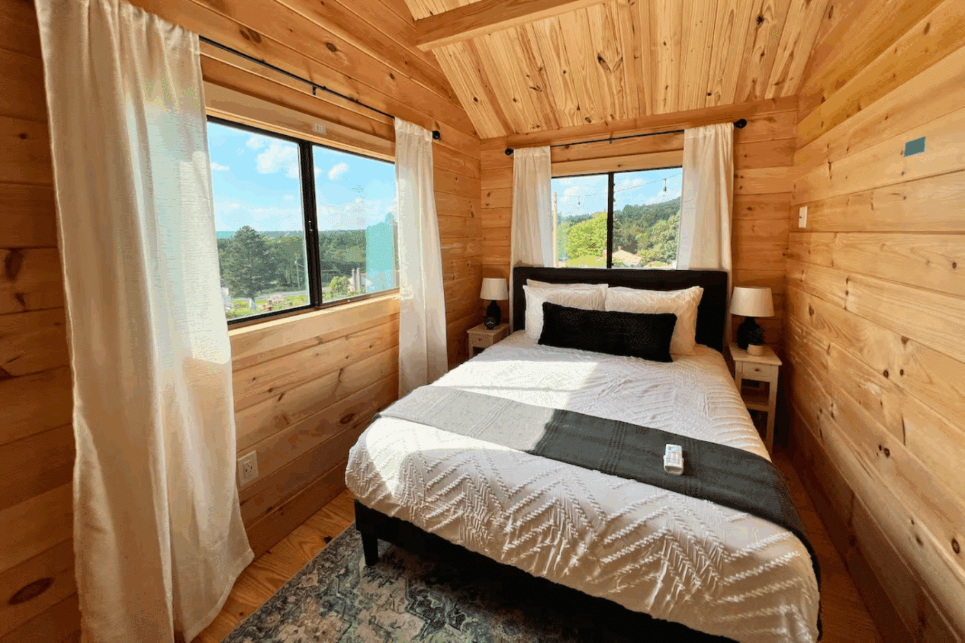 Main bedroom in Pinecrest park model tiny home built and designed by Zook Cabins in Gap Pa