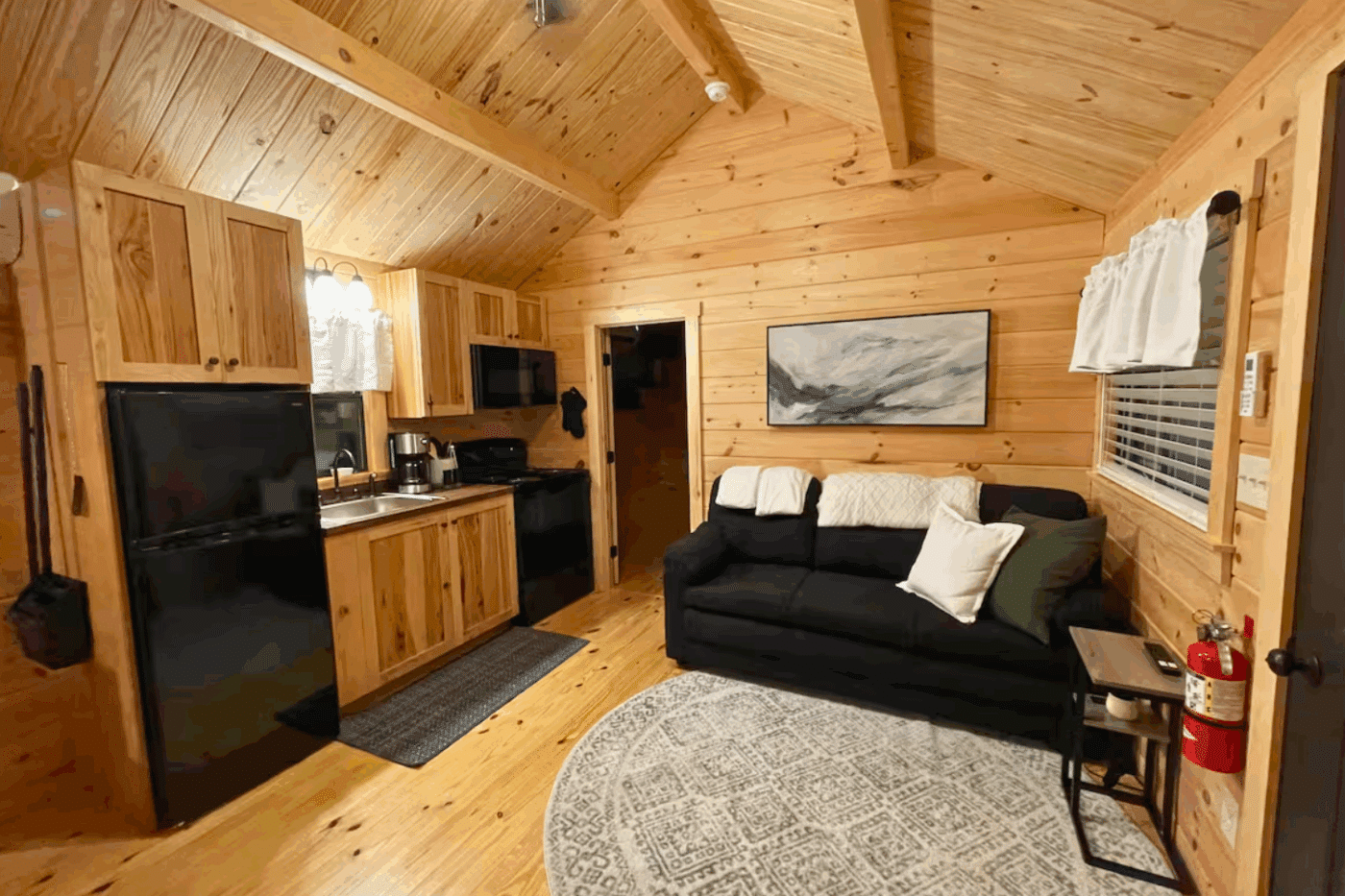 living room of Pinecrest park model tiny home built and designed by Zook Cabins in Gap Pa