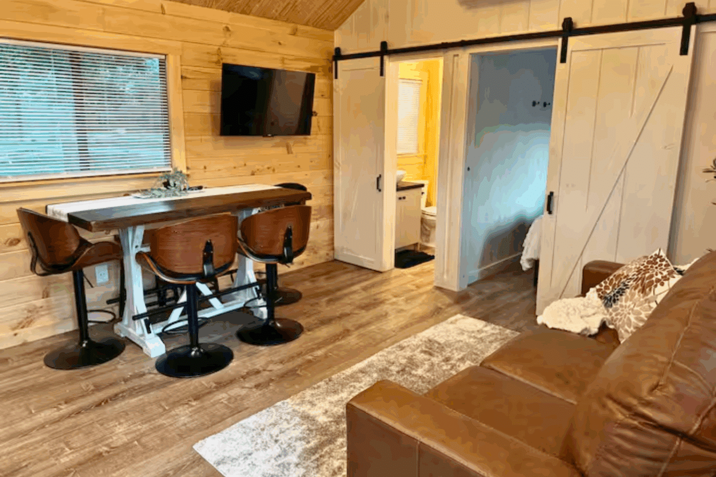 Dining Area of Pinecrest park model tiny home At Red Run Resort site 65 built and designed by Zook Cabins