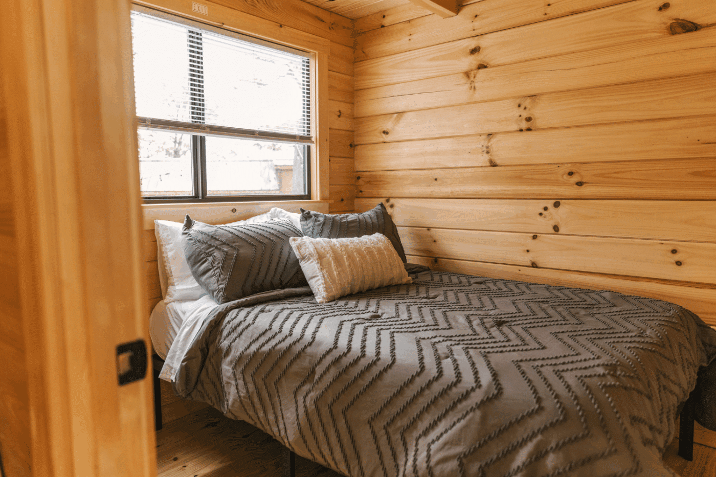 bedroom 2 of pinecrest park model tiny home in Somerset Pa built and designed by Zook Cabins