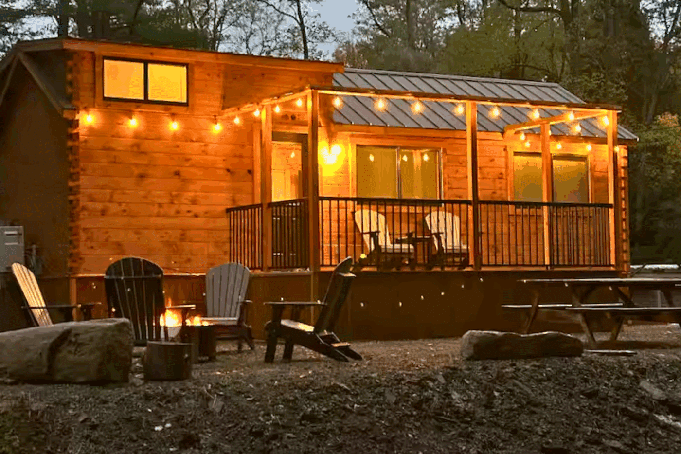 Spring Mills Pennsylvania Pinecrest Park model tiny home built and designed by Zook Cabins with aftermarket front porch