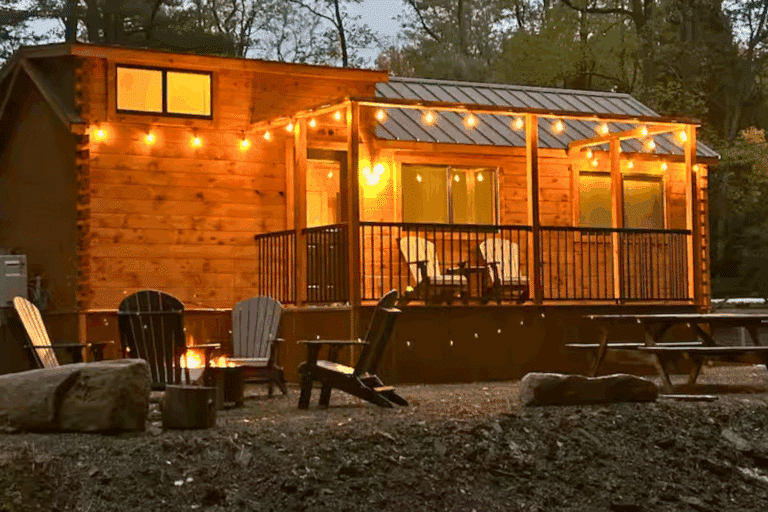 Spring Mills Pennsylvania Pinecrest Park model tiny home built and designed by Zook Cabins with aftermarket front porch
