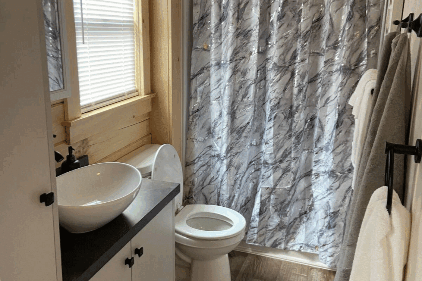 bathroom of Pinecrest park model tiny home built and designed by Zook Cabins