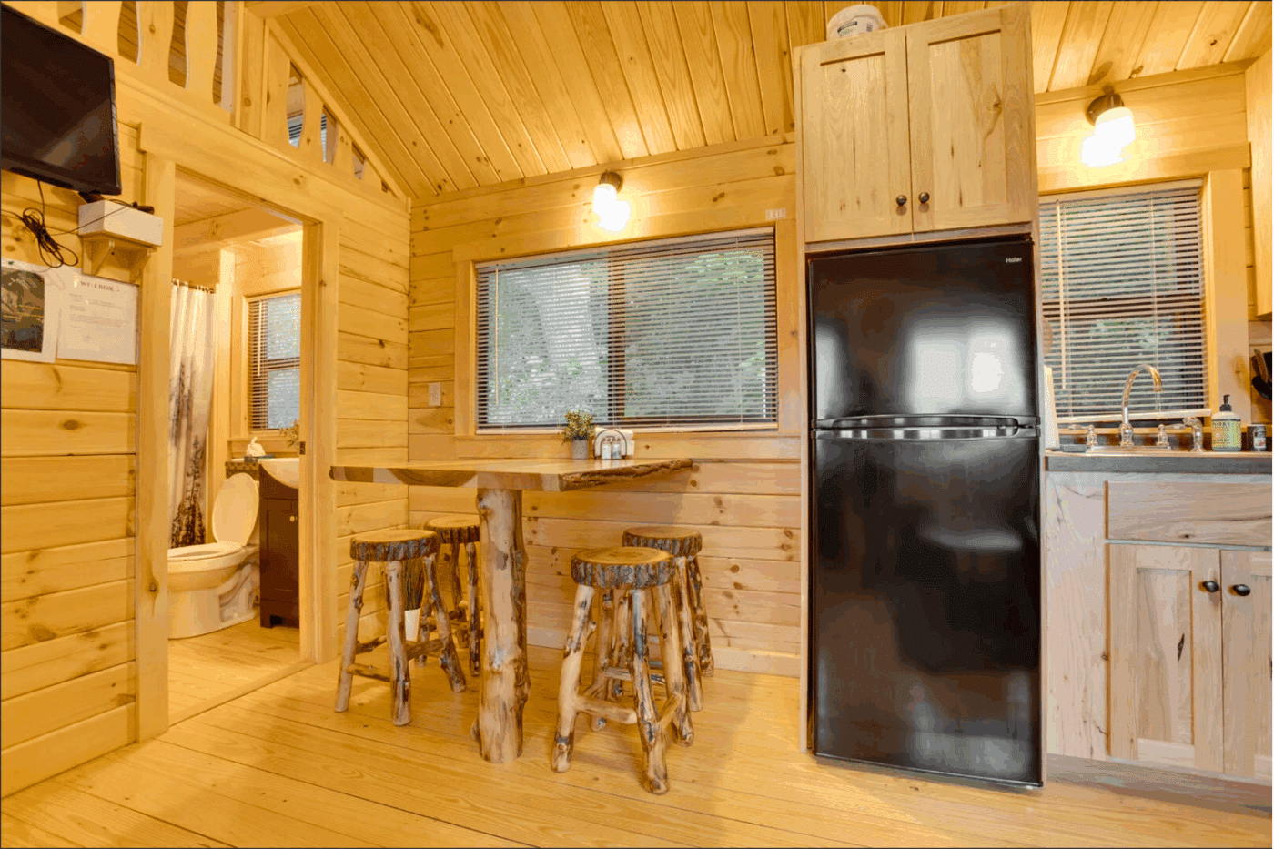 Dining area in Pinecrest park model cabin in warfordsburg Pa built and designed by Zook Cabins in Gap Pa