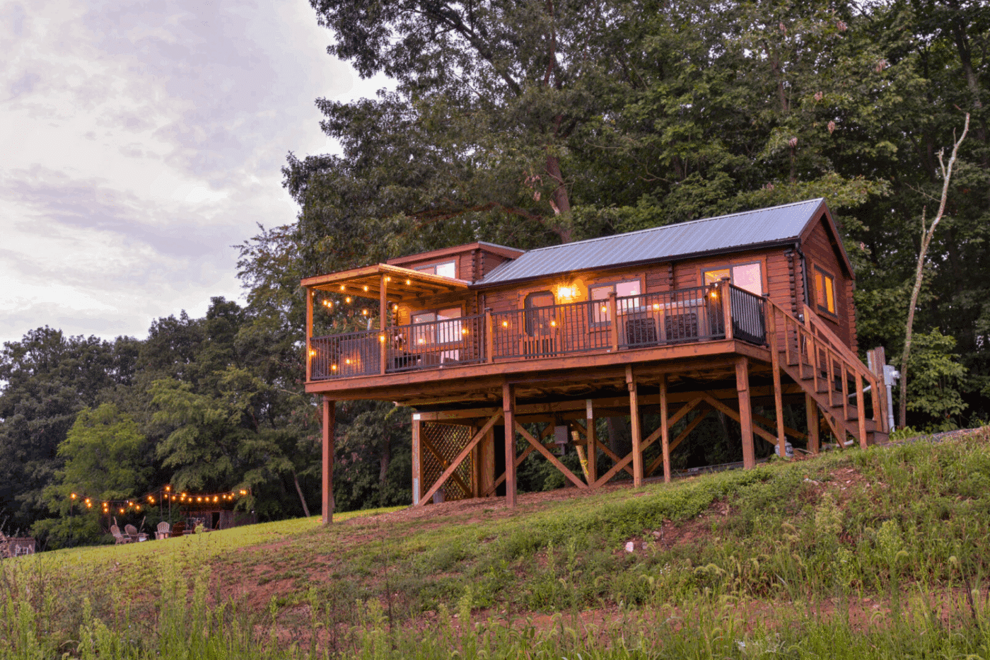 Pinecrest Park model tiny home built and designed by Zook Cabins in Warfordsburg Pa on treehouse style foundation