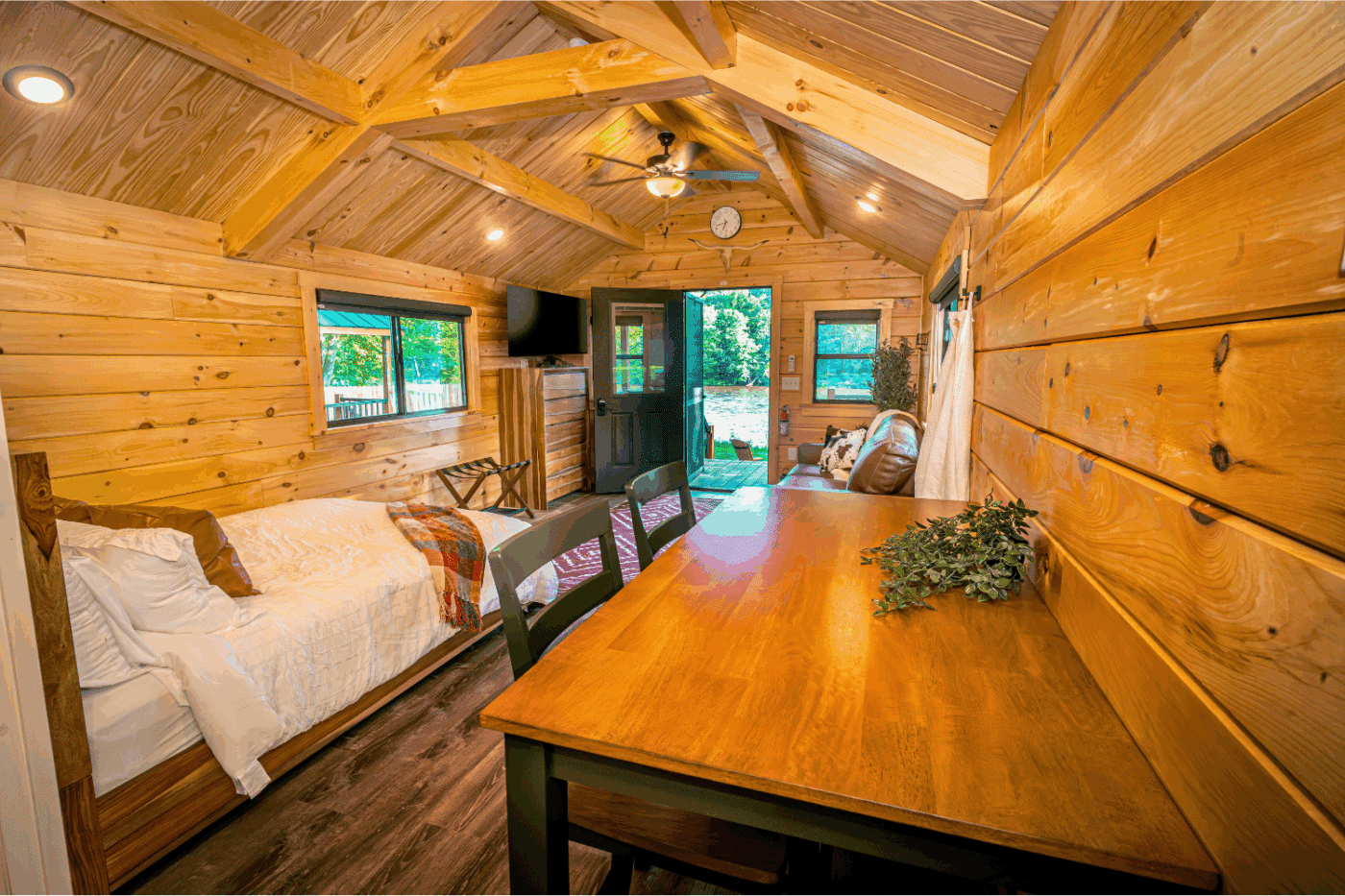 common area of log studio park model tiny home cabin 1