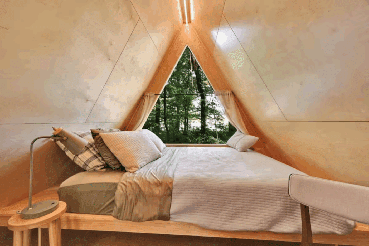 queen sized platform bed in Vista Glamping pod in Atglen Pa built and designed by Zook Cabins in Gap Pa