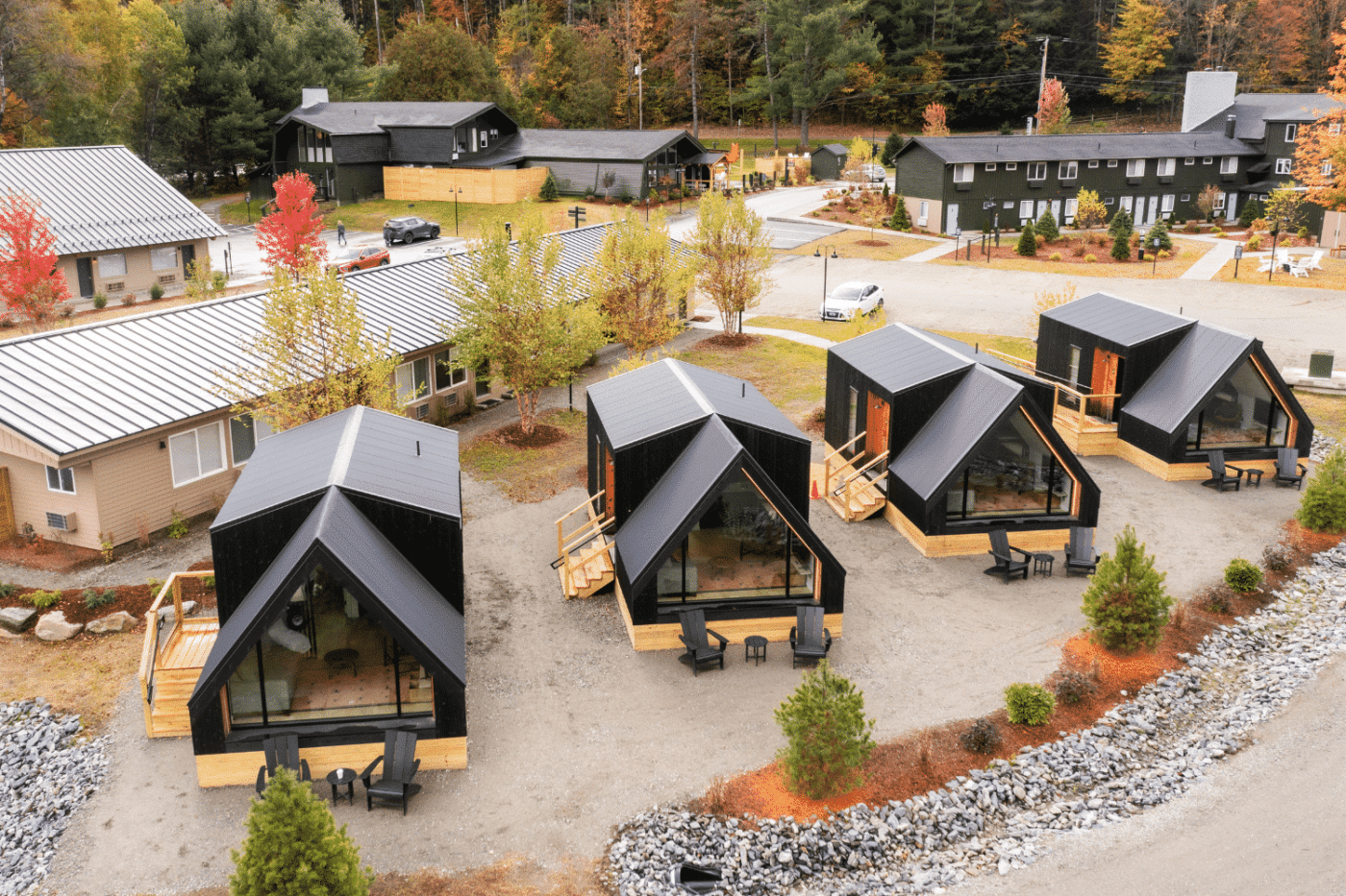 aerial view of park model tiny home community in Iowa with black a grame homes on permanent foundations