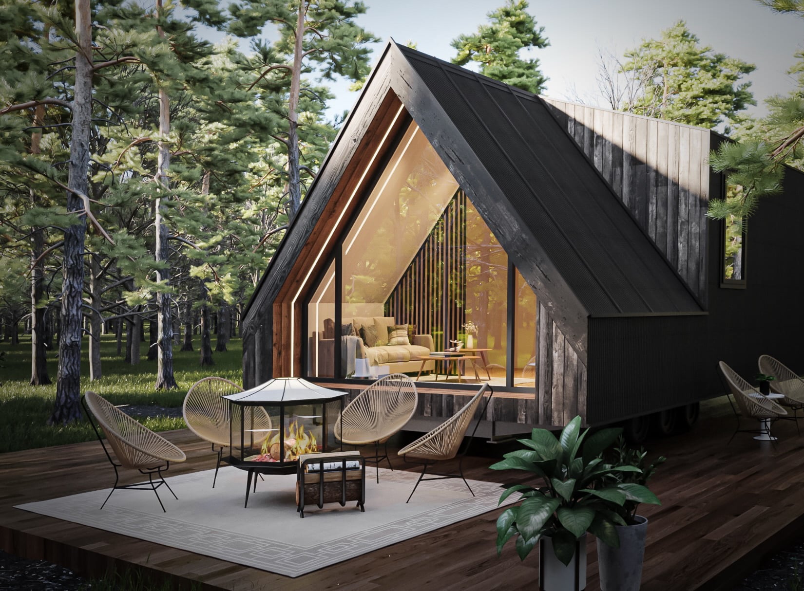 A-frame tiny home with large glass front, featuring a cozy, well-lit interior. The home sits on a wooden deck surrounded by tall trees, with an outdoor seating area and a small fire pit in front.