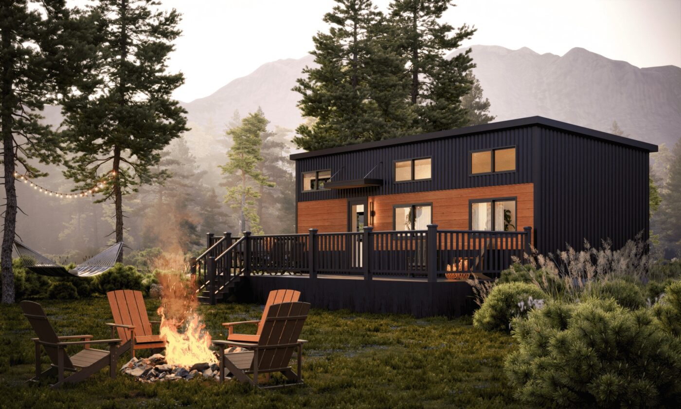 Contemporary Cascade park model with black siding, wood accents, and spacious deck with Adirondack chairs around a firepit.