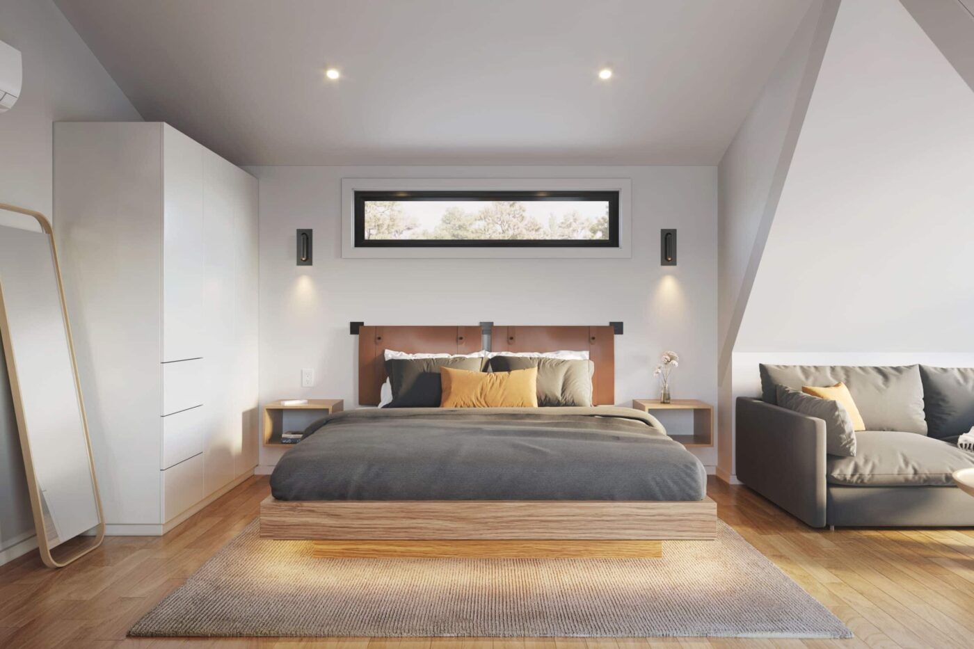 Modern A-frame studio park model bedroom with platform bed, sofa, and natural light from a horizontal window.