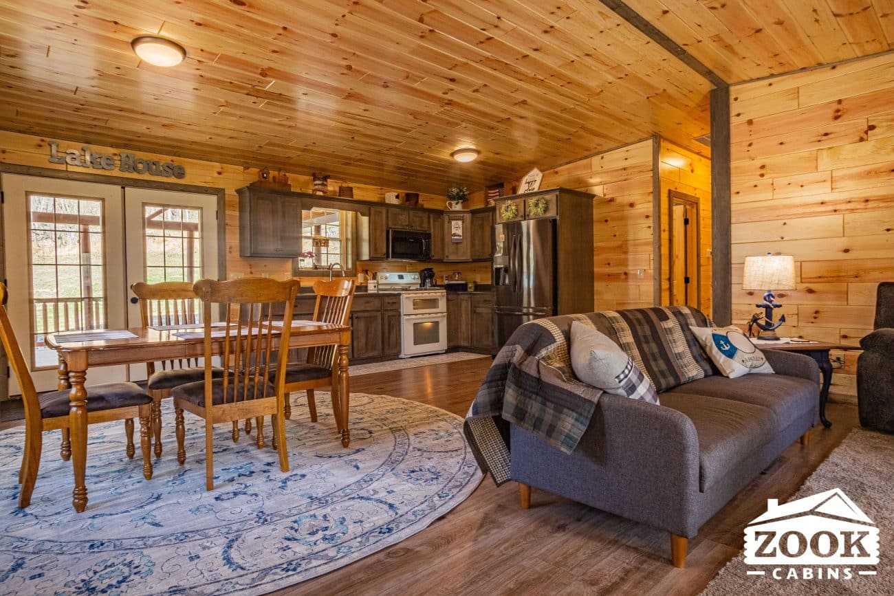 the finished interior of a log prefab cabin style for sale in idaho