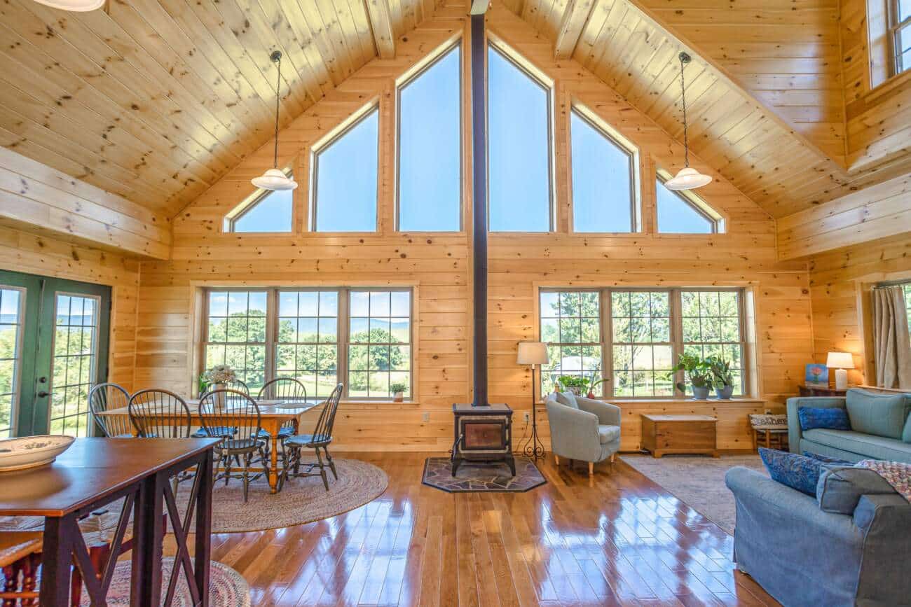 the interior of a log cabin model for sale in vermont built by prefab log cabin builders