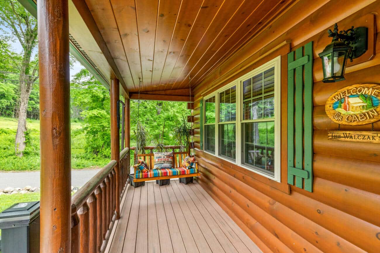 log cabin homes in kentucky with a porch